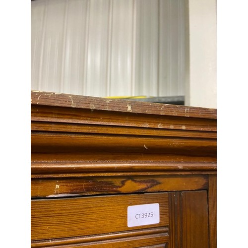 3096 - Pitch pine linen press with two lower drawers, 126 x 44 x 208 cm H. Standard usage marks to interior... 