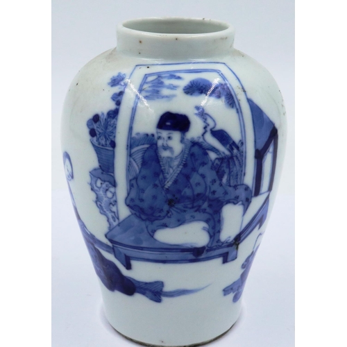 3299 - A Kangxi glazed baluster form jar of diminutive proportions, simply decorated in blue of two seated ... 