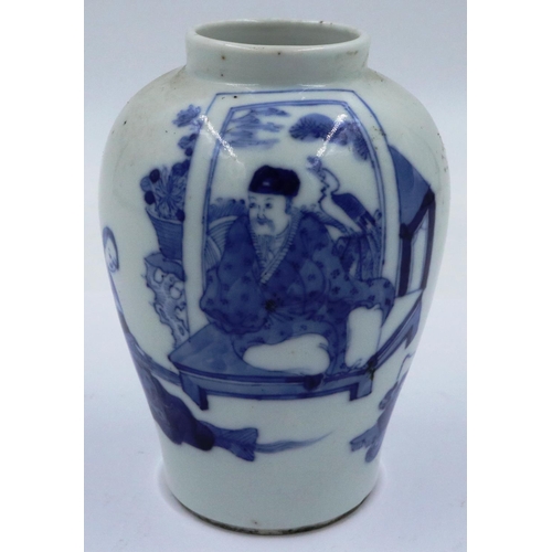 3299 - A Kangxi glazed baluster form jar of diminutive proportions, simply decorated in blue of two seated ... 