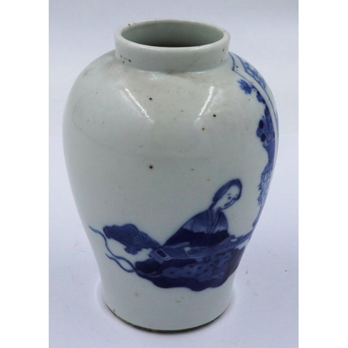 3299 - A Kangxi glazed baluster form jar of diminutive proportions, simply decorated in blue of two seated ... 