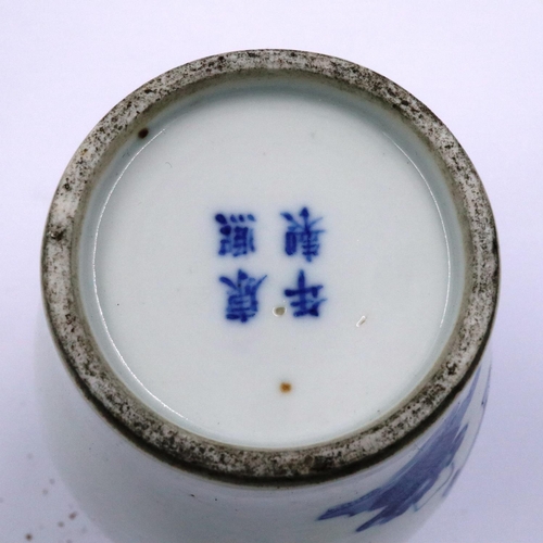 3299 - A Kangxi glazed baluster form jar of diminutive proportions, simply decorated in blue of two seated ... 