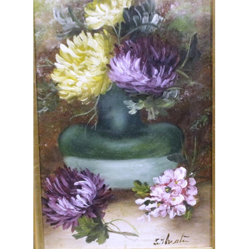 2061 - A Victorian oil on board, still life floral arrangement, indistinctly signed, 18 x 28 cm. Not availa... 