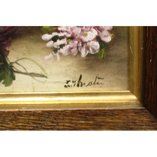 2061 - A Victorian oil on board, still life floral arrangement, indistinctly signed, 18 x 28 cm. Not availa... 