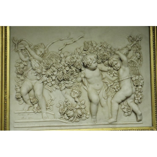 2071 - A 20th century gilt framed hall mirror with resin cherub panel, overall 60 x 115 cm. Not available f... 