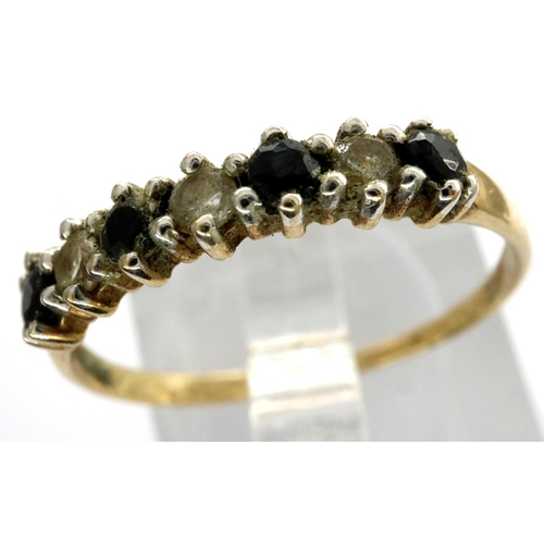 10 - 9ct gold ring set with sapphires and CZ stones, size P, 1.2g. P&P Group 1 (£14+VAT for the first lot... 