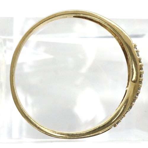 33 - 9ct gold crossover ring set with diamonds, size P, 1.1g. P&P Group 1 (£14+VAT for the first lot and ... 