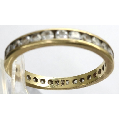 34 - 9ct gold eternity ring set with CZ stones, size N, 1.9g. P&P Group 1 (£14+VAT for the first lot and ... 