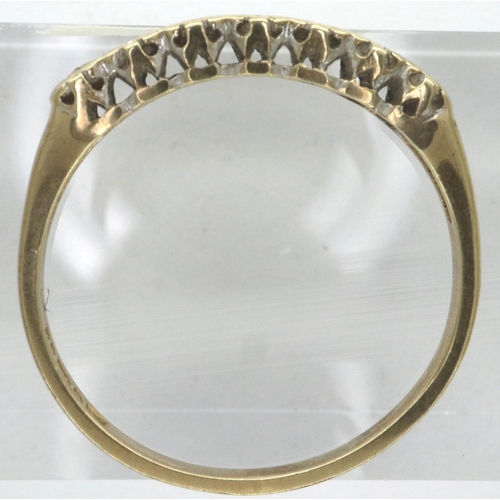 4 - 9ct gold ring set with seven diamonds, size N/O, 1.3g. P&P Group 1 (£14+VAT for the first lot and £1... 