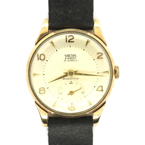 55 - Smiths: Everest gents 9ct gold fifteen jewel wristwatch on leather strap, works for a second then st... 