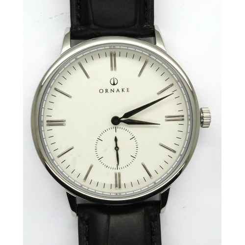 59 - Ornake: new old stock gents wristwatch with white dial, requires battery. P&P Group 1 (£14+VAT for t... 