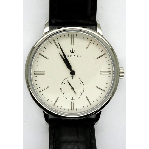 61 - Ornake: new old stock gents wristwatch with white dial, boxed, requires battery. P&P Group 1 (£14+VA... 