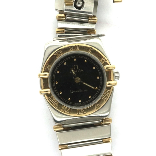 64 - Omega: Constellation ladies wristwatch, gold and steel cased with graduated bracelet, black dial wit... 