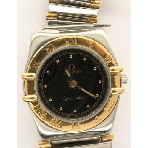 64 - Omega: Constellation ladies wristwatch, gold and steel cased with graduated bracelet, black dial wit... 