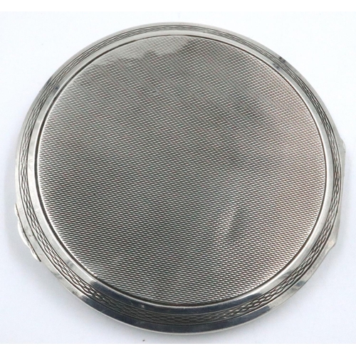 90 - Hallmarked silver compact, Birmingham assay 1935 with metal fitting, D: 90 mm. No internal mirror. P... 