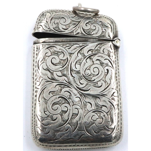 92 - Hallmarked silver vesta case, Birmingham assay 1918, with engraved decoration, clasp fully functiona... 