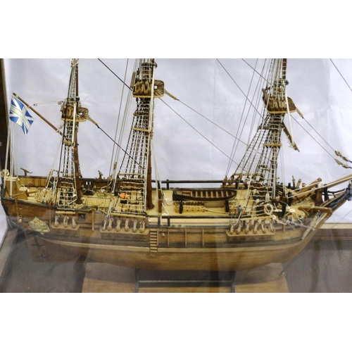 396 - Glass cased handmade wooden model of HMS Bounty armed vessel 1787, museum quality build, 1/60 scale ... 