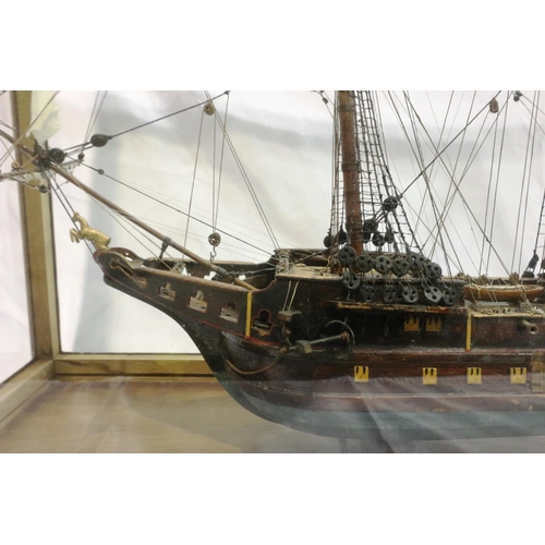 397 - Glass cased handmade wooden model of a 17th century three most sailing ship, museum quality approxim... 