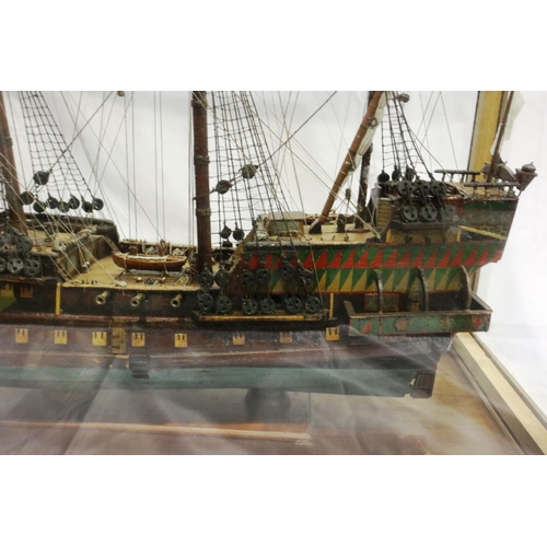 397 - Glass cased handmade wooden model of a 17th century three most sailing ship, museum quality approxim... 