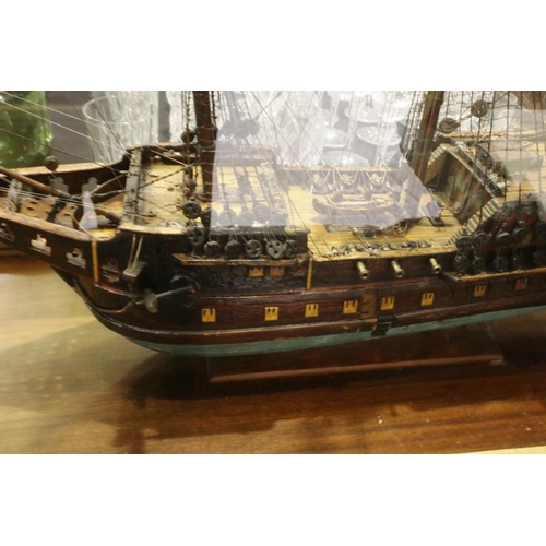 397 - Glass cased handmade wooden model of a 17th century three most sailing ship, museum quality approxim... 