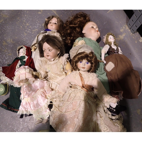 1064 - Quantity of porcelain and wooden dolls. Not available for in-house P&P