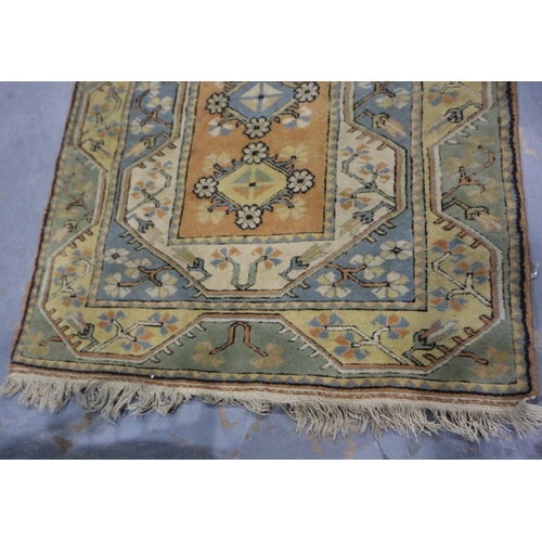 2113 - An early 20th century hand knotted Turkish woollen rug, 196 x 117 cm. Not available for in-house P&P
