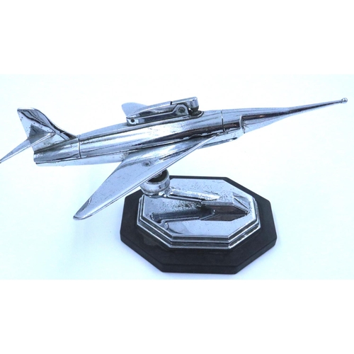 152 - Chrome plated jet plane table lighter on octagonal base, L: 23 cm. P&P Group 1 (£14+VAT for the firs... 