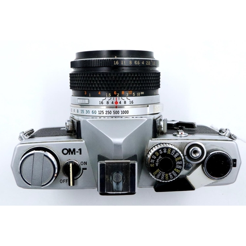 164 - Olympus OM1 camera with Zuiko 50 mm, F1.8 lens. P&P Group 2 (£18+VAT for the first lot and £3+VAT fo... 