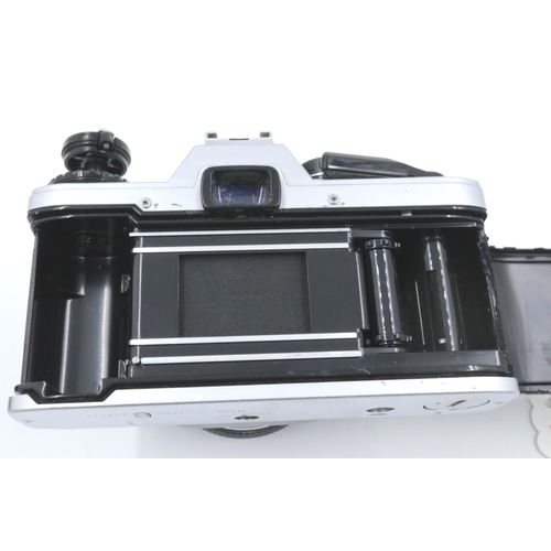 172 - Olympus OM10 camera with Zuiko 50 mm F1.8 lense and case. P&P Group 2 (£18+VAT for the first lot and... 