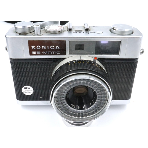 175 - Two vintage film cameras, a Konica EEMatic deluxe rangefinder and a Pal M4, both in leather cases an... 