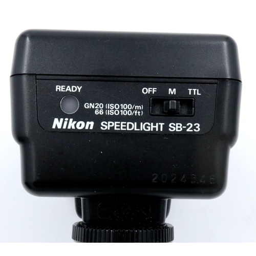 179 - Nikon film camera F301 with Nikkor 50mm F1.8 lens and Nikon leather case, Nikon SP23 flash, bagged. ... 