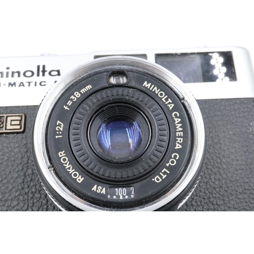 180 - 2 Minolta rangefinder film cameras, cased, Himatic F and 24 rapid. P&P Group 2 (£18+VAT for the firs... 