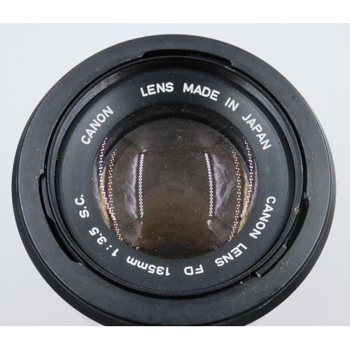 181 - Canon T90 camera with lenses in a hard case. P&P Group 2 (£18+VAT for the first lot and £3+VAT for s... 