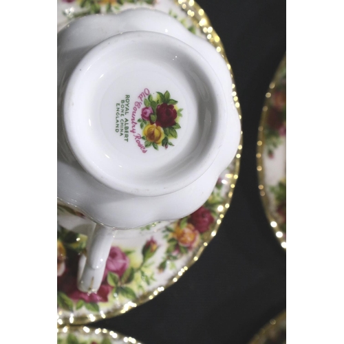 292 - Tea and dinner service of Royal Albert Old Country Roses including placemats , (38) no chips or crac... 