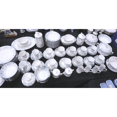 294 - Substantial Noritake dinner and teaware in the Blue Hill pattern (109) including a cake plate, no ch... 