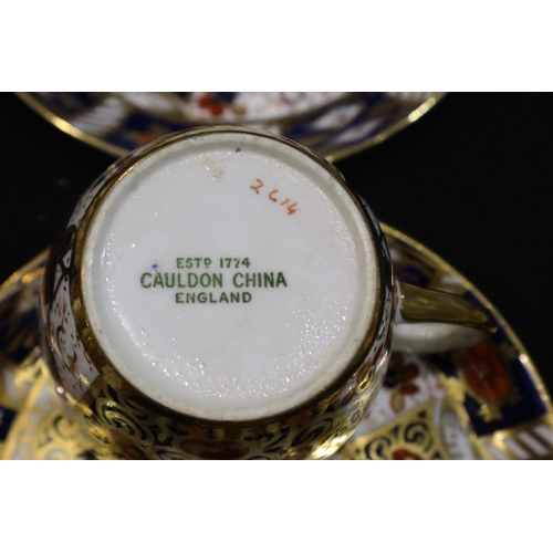 329 - Ten Cauldon China 2614 pattern coffee cans and twelve saucers, one saucer with repair. P&P Group 3 (... 