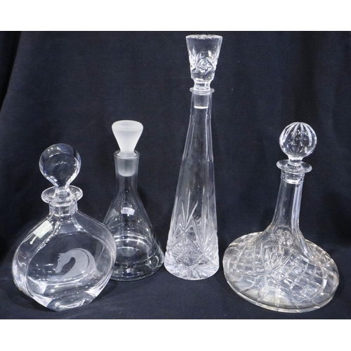 335 - Four glass decanters including two etched with horses, tallest H: 40 cm. Not available for in-house ... 