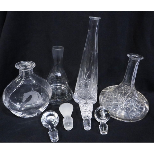 335 - Four glass decanters including two etched with horses, tallest H: 40 cm. Not available for in-house ... 