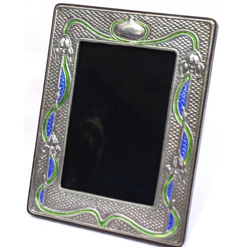 355 - Sterling silver Art Noveau picture frame, 19 x 15 cm. Minor dents to frame, glass is good no scratch... 