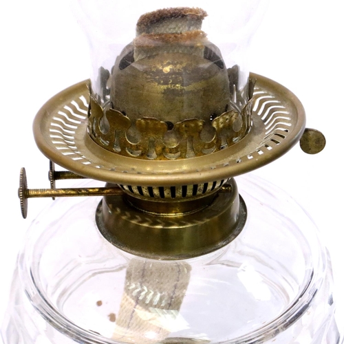 370 - Victorian brass paraffin lamp decorated with storks. Not available for in-house P&P