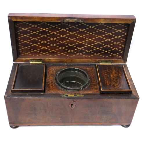 375 - Walnut rectangular tea caddy with boxwood stringing two silvered lidded caddies and glass mixing bow... 