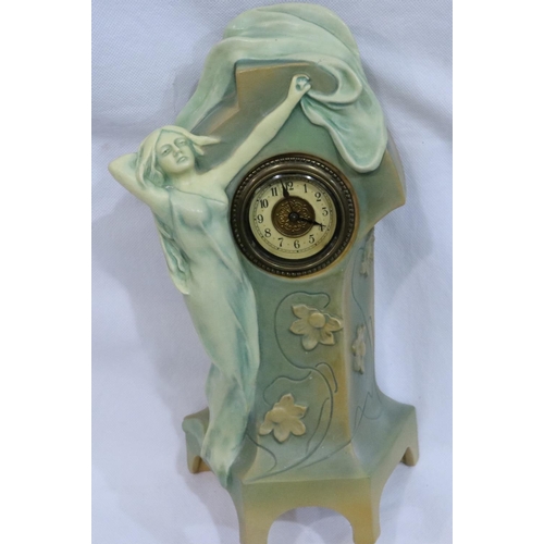 387 - Ceramic Art Noveau clock, working at lotting, H: 30 cm, indistinctly signed. P&P Group 3 (£25+VAT fo... 