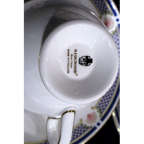 211 - Wedgwood dinner service in the Waverley pattern (75), no chips or cracks. Not available for in-house... 