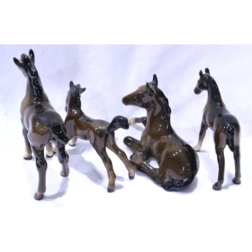 213 - Four Beswick foals, largest L: 14 cm, No cracks or chips. P&P Group 2 (£18+VAT for the first lot and... 