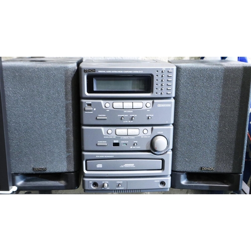 463 - Denon Personal audio system DC1 with two speakers. All electrical items in this lot have been PAT te... 