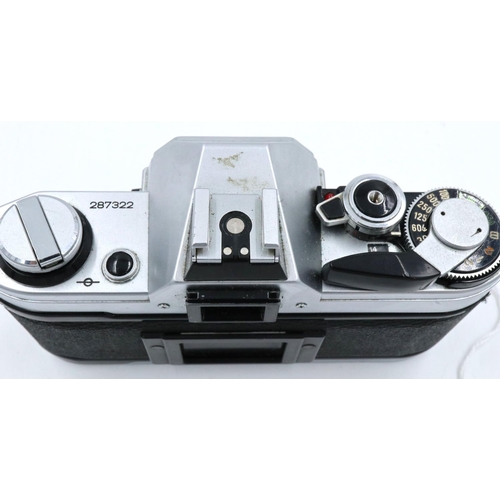 160 - Canon AE-1 35mm SLR camera body with instruction book. P&P Group 1 (£14+VAT for the first lot and £1... 