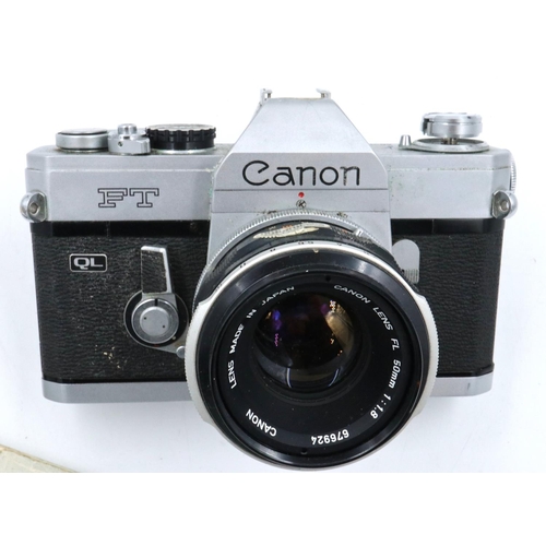 181A - Canon FT 35mm SLR camera body with Canon 1:1.8 FL lens and instruction manual. P&P Group 1 (£14+VAT ... 