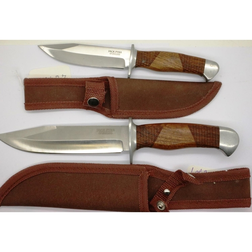 2029 - Two hunting knives by Jack Pyke, each with walnut grips and canvas sheathes. P&P Group 3 (£25+VAT fo... 