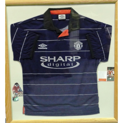 2039 - Framed Manchester United Football Club blue Umbro shirt, Sharp, signed by George Best, 78 x 86 cm. P... 