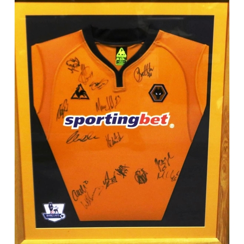 2043 - Framed Wolverhampton wanderers FC rugby orange Le Coq Sportif shirt/Sporting Bet, signed, 76 x 89 cm... 