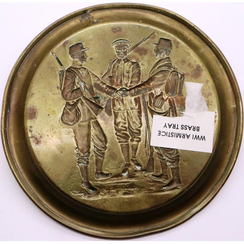 2063 - WWI Armistice brass ashtray with relief decoration. P&P Group 1 (£14+VAT for the first lot and £1+VA... 